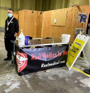 Reel Medics in Motion Covid19 Checkin Table